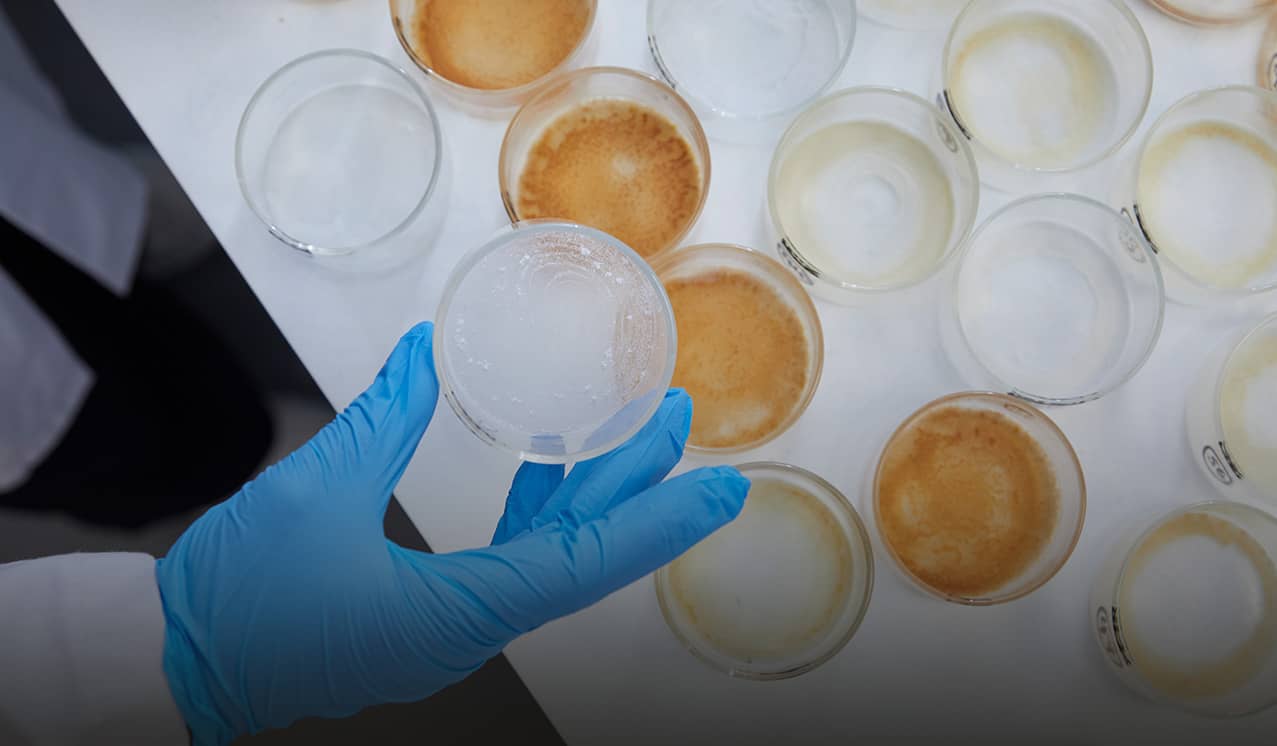 Scientist handling chemicals
